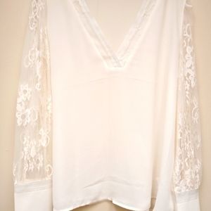 White blouse with lace sleeves